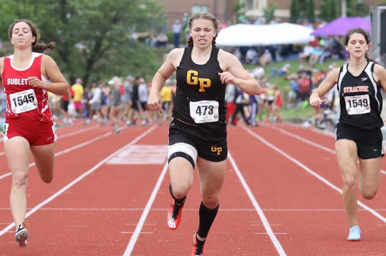 Garden Plain's Brooke Hammond (center) started off her high school track career in style earning gold medals in the 100, 200 and 400 relay in just her freshman season at May's Kansas State Track & Field Championships. (Photo by Huey Counts)