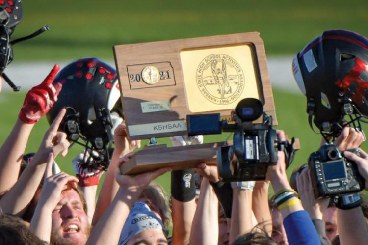 Down to four teams in each class fighting for the right to battle for one of these trophies with 2022 on it. (File Photo)