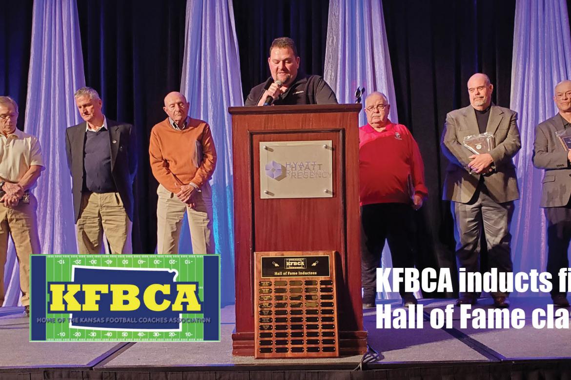 From left-to-right: Tom Young, Chuck Smith, Dick Purdy, KFBCA president Justin Burke, Roger Barta, Marvin Diener and Gary Cornelsen. Not pictured: Pete Kriwiel, son of the late Eddie Kriwiel who passed away in 2008. (Photo by Kansas Pregame publisher John Baetz)