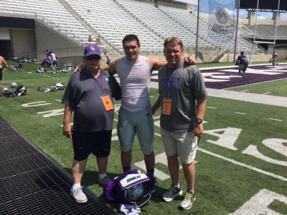 Roger, Mason and Brooks Barta stop for a photo after a K-State football practice in Manhattan last summer. (Courtesy Photo)