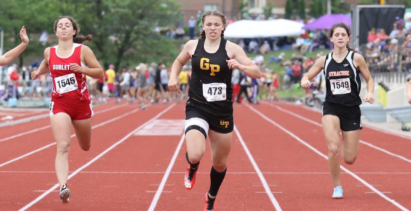 Garden Plain's Brooke Hammond (center) started off her high school track career in style earning gold medals in the 100, 200 and 400 relay in just her freshman season at May's Kansas State Track & Field Championships. (Photo by Huey Counts)