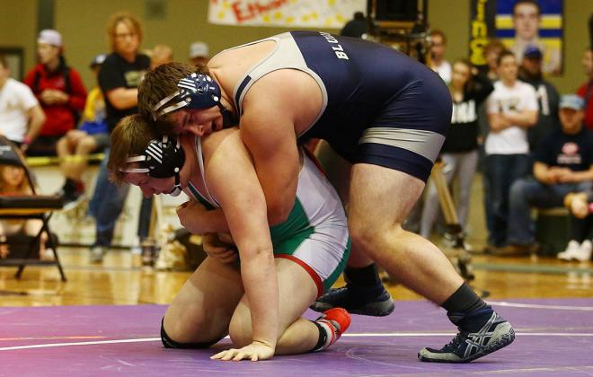 Elliott Strahm won a regional championship and continues his quest for a second consecutive 285 pound state title. (Photo by Everett Royer, KSportsImages.com)