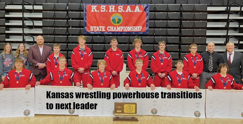 After winning the last four 3-2-1A state titles veteran Hoxie coach Mike Porsch (far right) has decided to hand the reins of the program to Ryan Etherton (standing next to Porsch). Porsch led the Indians to one of the most successful four-year stretches for any sport in Kansas, including a 60-point margin of victory over Norton in February. The 2023 Hoxie team destroyed the state record for team points at the 3-2-1A championship scoring 260 to runner-up Norton's 101.5. (Photo: Hoxie Wrestling Twitter/X) After winning the last four 3-2-1A state titles veteran Hoxie coach Mike Porsch (far right) has decided to hand the reins of the program to Ryan Etherton (standing next to Porsch). Porsch led the Indians to one of the most successful four-year stretches for any sport in Kansas, including a 60-point margin of victory over Norton in February. The 2023 Hoxie team destroyed the state record for team points at the 3-2-1A championship scoring 260 to runner-up Norton's 101.5. (Photo: Hoxie Wrestling Twitter/X)
