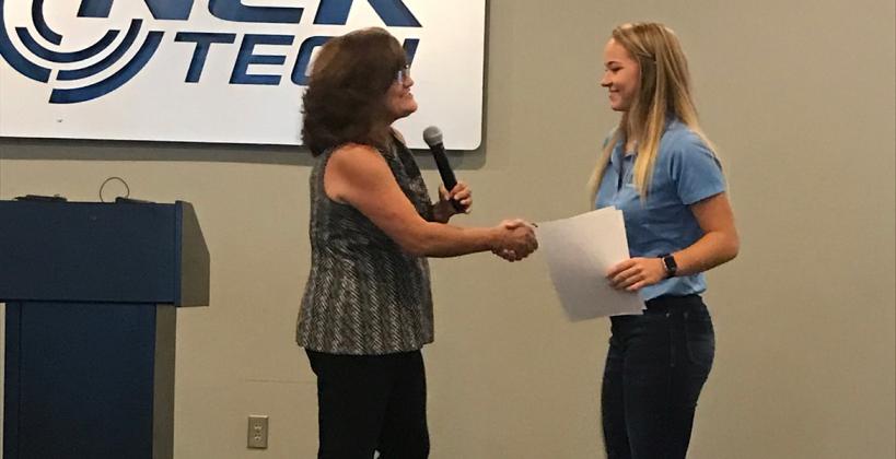 Nex-Generation Round-up for Youth director Jacque Beckman congratulates Lauryn Dubbert for her graduation from the program following a summer working for Kansas Pregame.