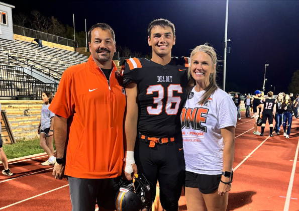 Brody Litton, pictured with parents Travis and Stephanie, has learned to manage Type 1 Diabetes while competing as a high-level athlete in football, basketball, and track & field. (Submitted)