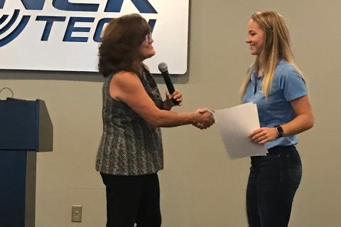 Nex-Generation Round-up for Youth director Jacque Beckman congratulates Lauryn Dubbert for her graduation from the program following a summer working for Kansas Pregame.