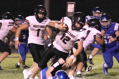 Sylvan-Lucas has nearly 40 players out for 8-Man football after gaining a number of students following the Wilson school closure and the Mustangs looks like an 8-Man II contender after a hard-fought win over a much-improved Lincoln team Friday night. (Photo: Lori Spear)