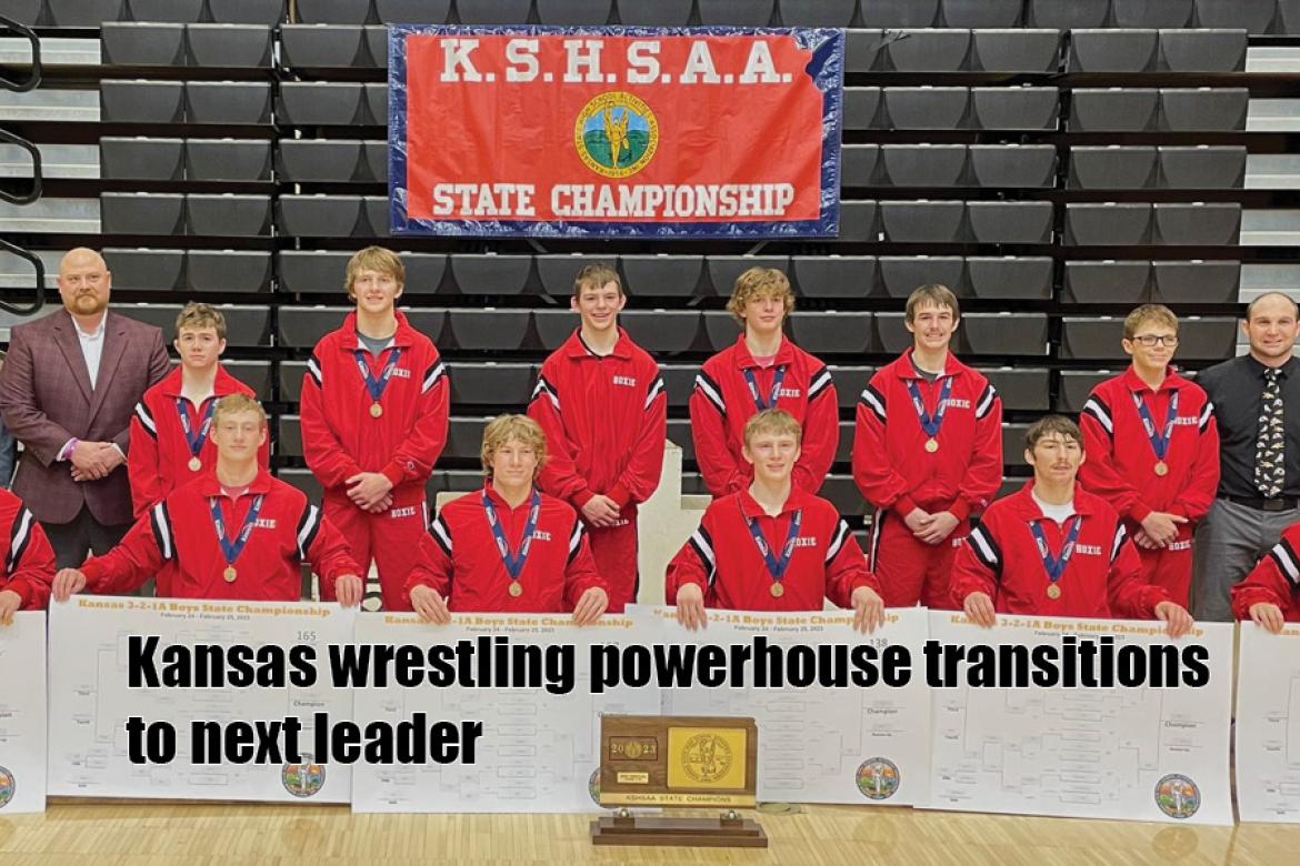 After winning the last four 3-2-1A state titles veteran Hoxie coach Mike Porsch (far right) has decided to hand the reins of the program to Ryan Etherton (standing next to Porsch). Porsch led the Indians to one of the most successful four-year stretches for any sport in Kansas, including a 60-point margin of victory over Norton in February. The 2023 Hoxie team destroyed the state record for team points at the 3-2-1A championship scoring 260 to runner-up Norton's 101.5. (Photo: Hoxie Wrestling Twitter/X)
